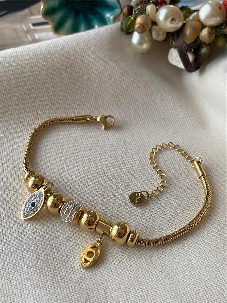 Çelik Göz Charmlı Silindir Bileklik