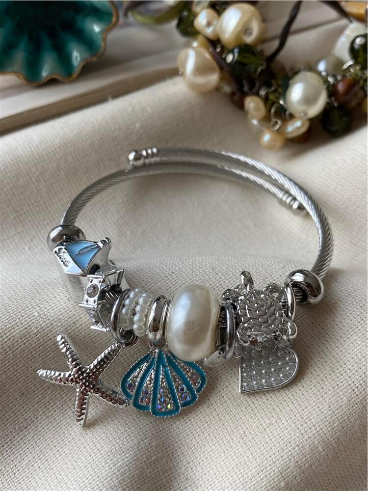 Çelik Kordonlu Mavi Kabuklu Denizyıldızı Charmlı Bileklik