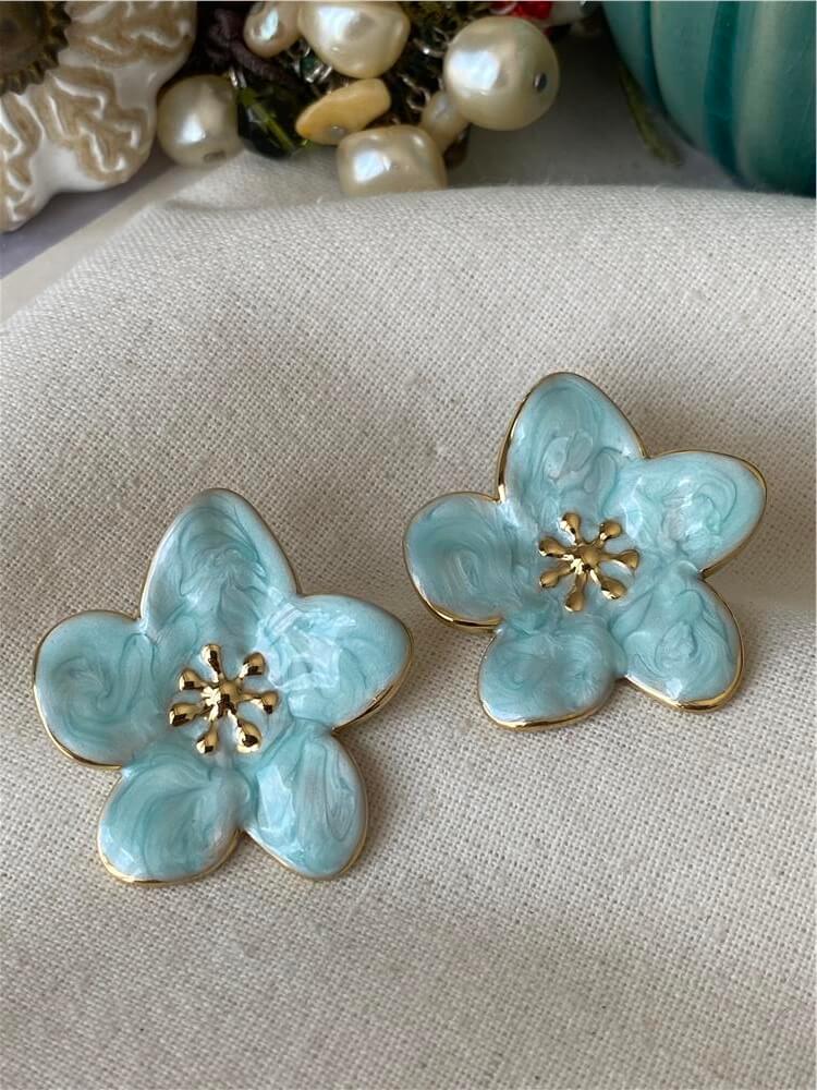 Çelik Mavi Çiçek Küpe