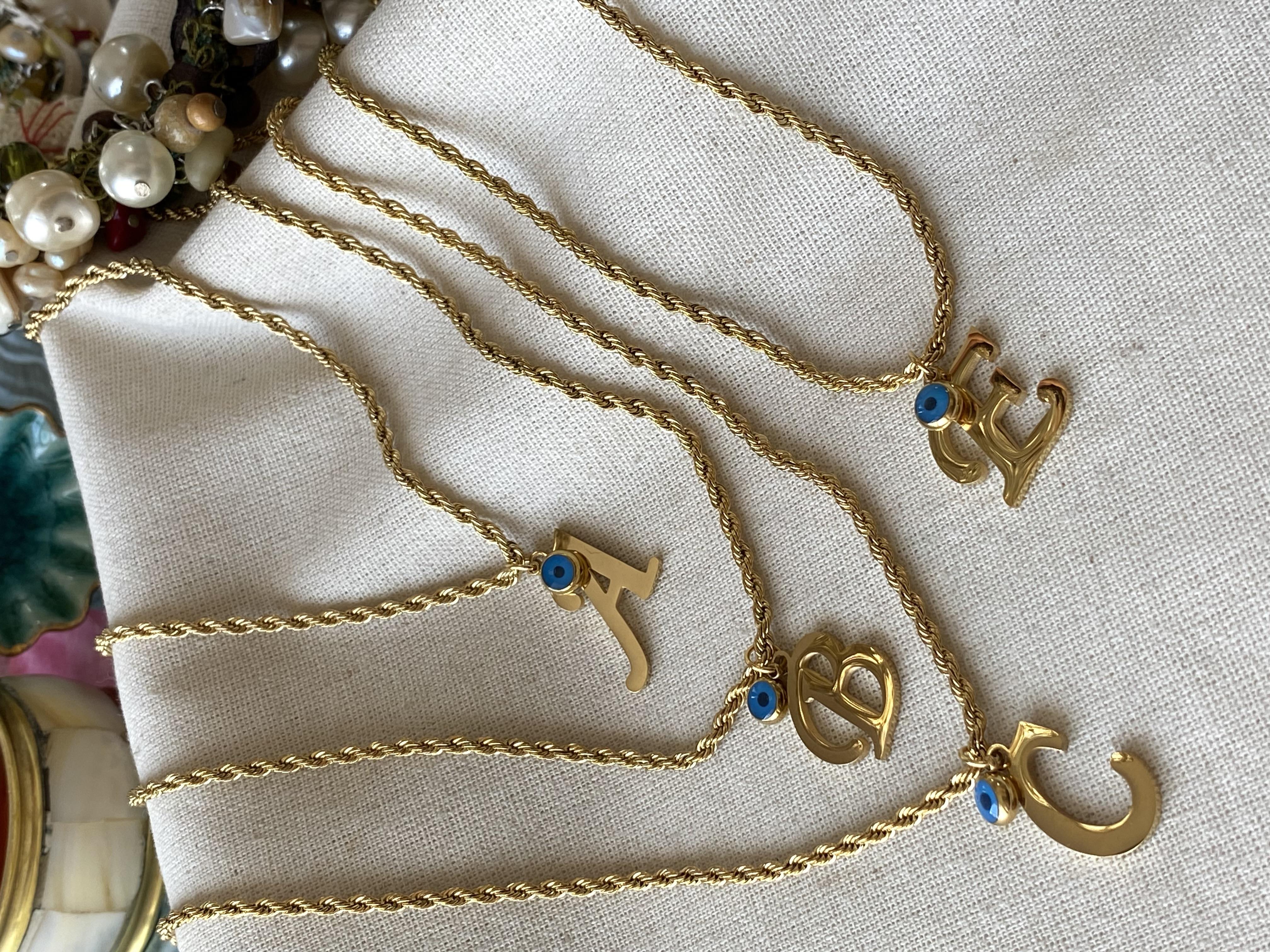 Çelik Nazarlı Harf Kolye