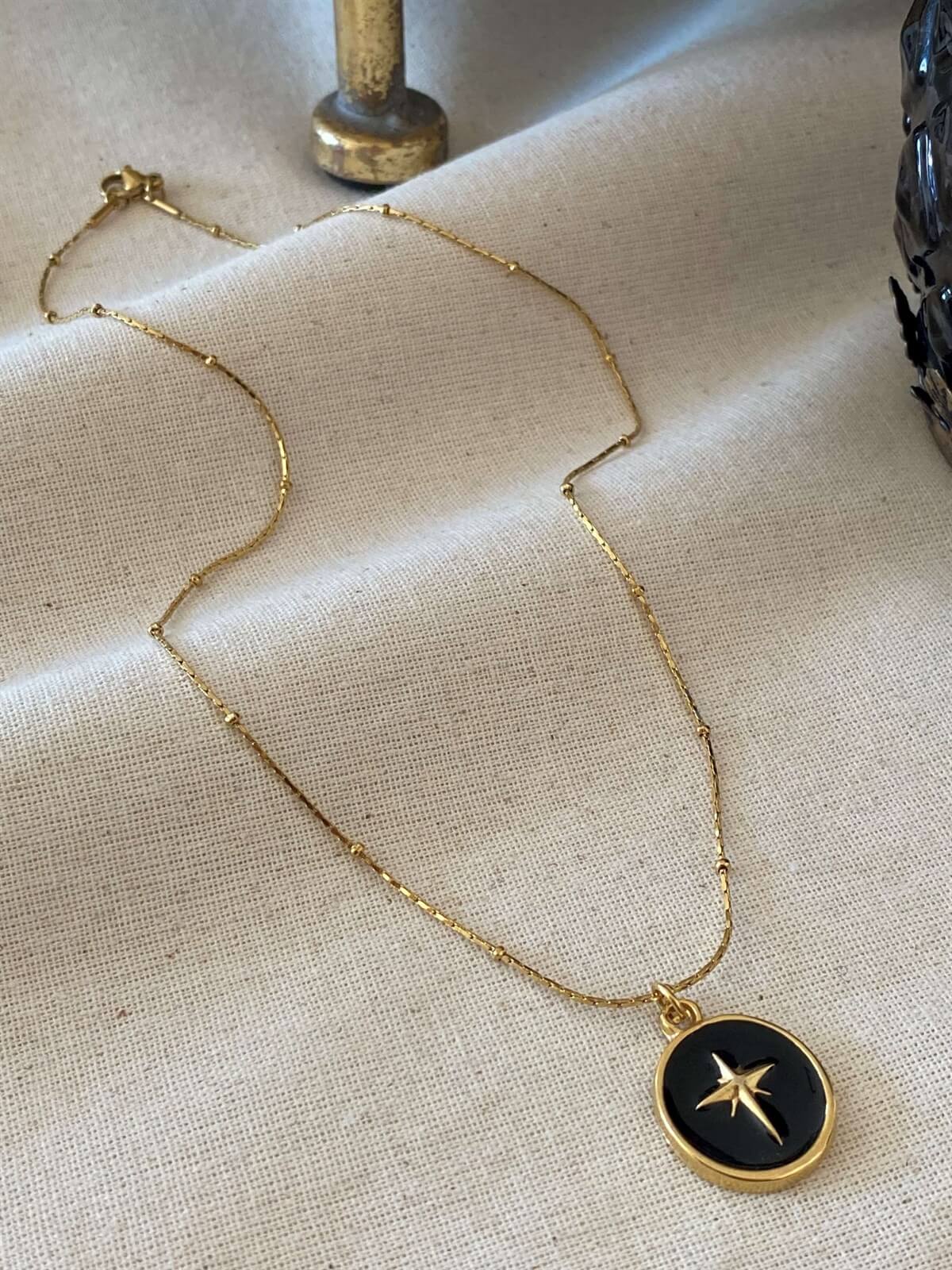 Çelik Oval Kutup Yıldızı Kolye