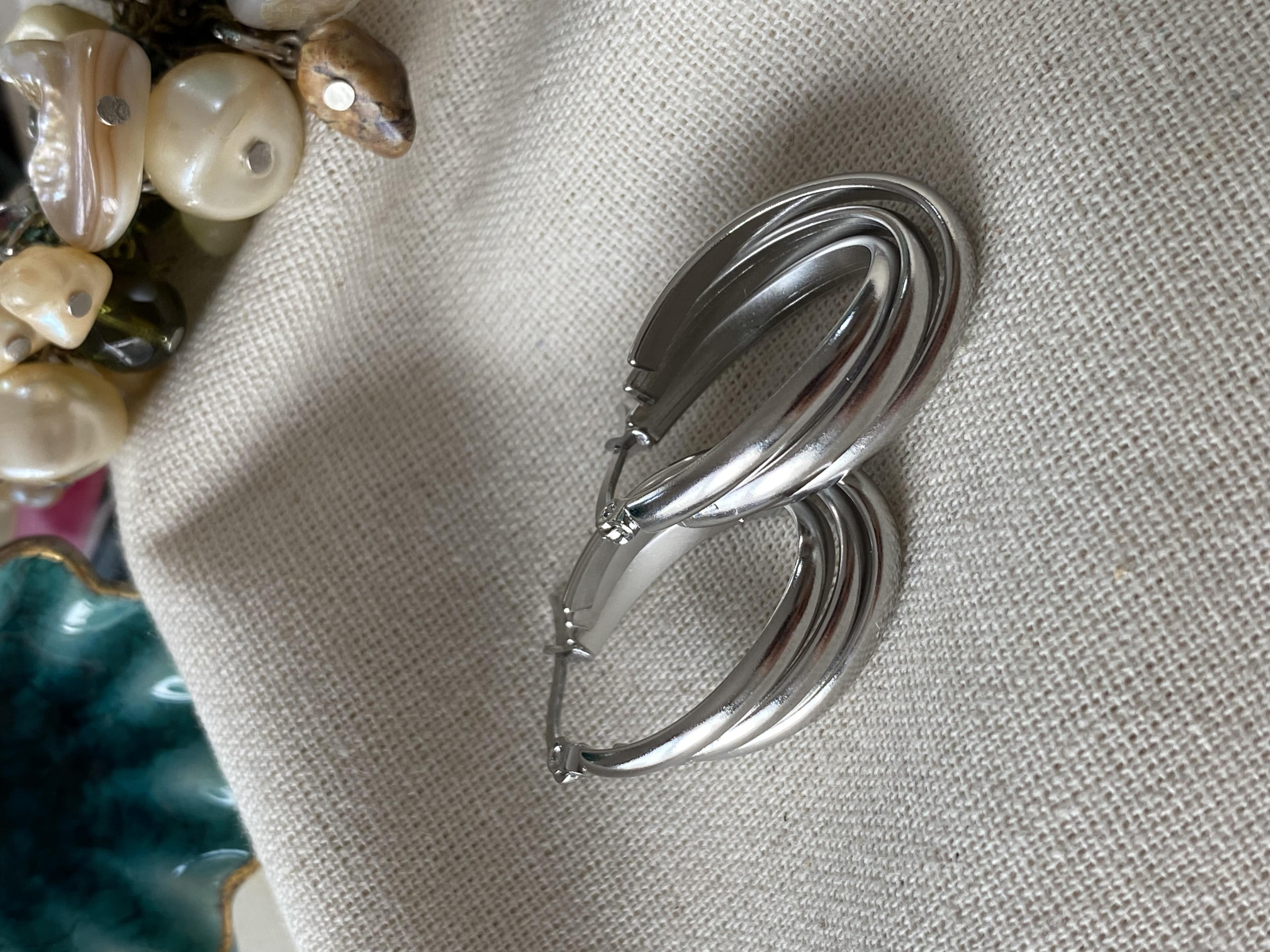 Çelik Oval Silver Trinity Küpe