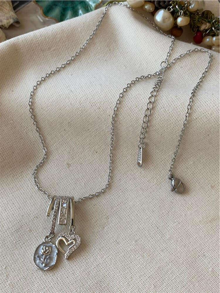 Çelik Silver Kalp ve Gül Sallantılı Kolye