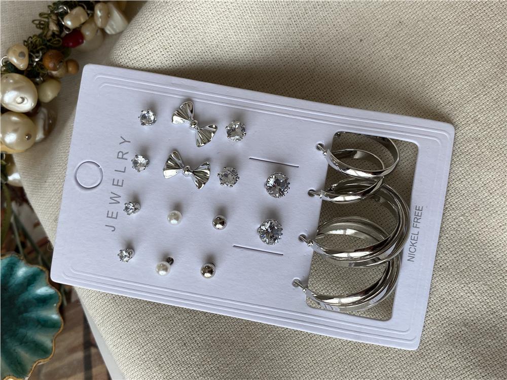 Çoklu Silver Fiyonk Konsept Küpe Seti