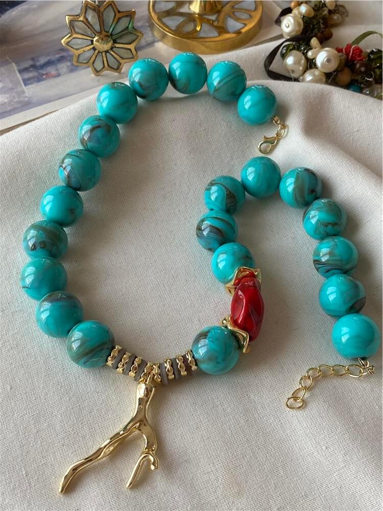 Gold Charm Detaylı Firuze Topçuk Kolye