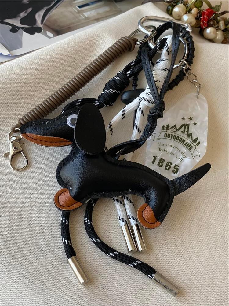 Kordon Detaylı Siyah Köpek Çanta Charmı