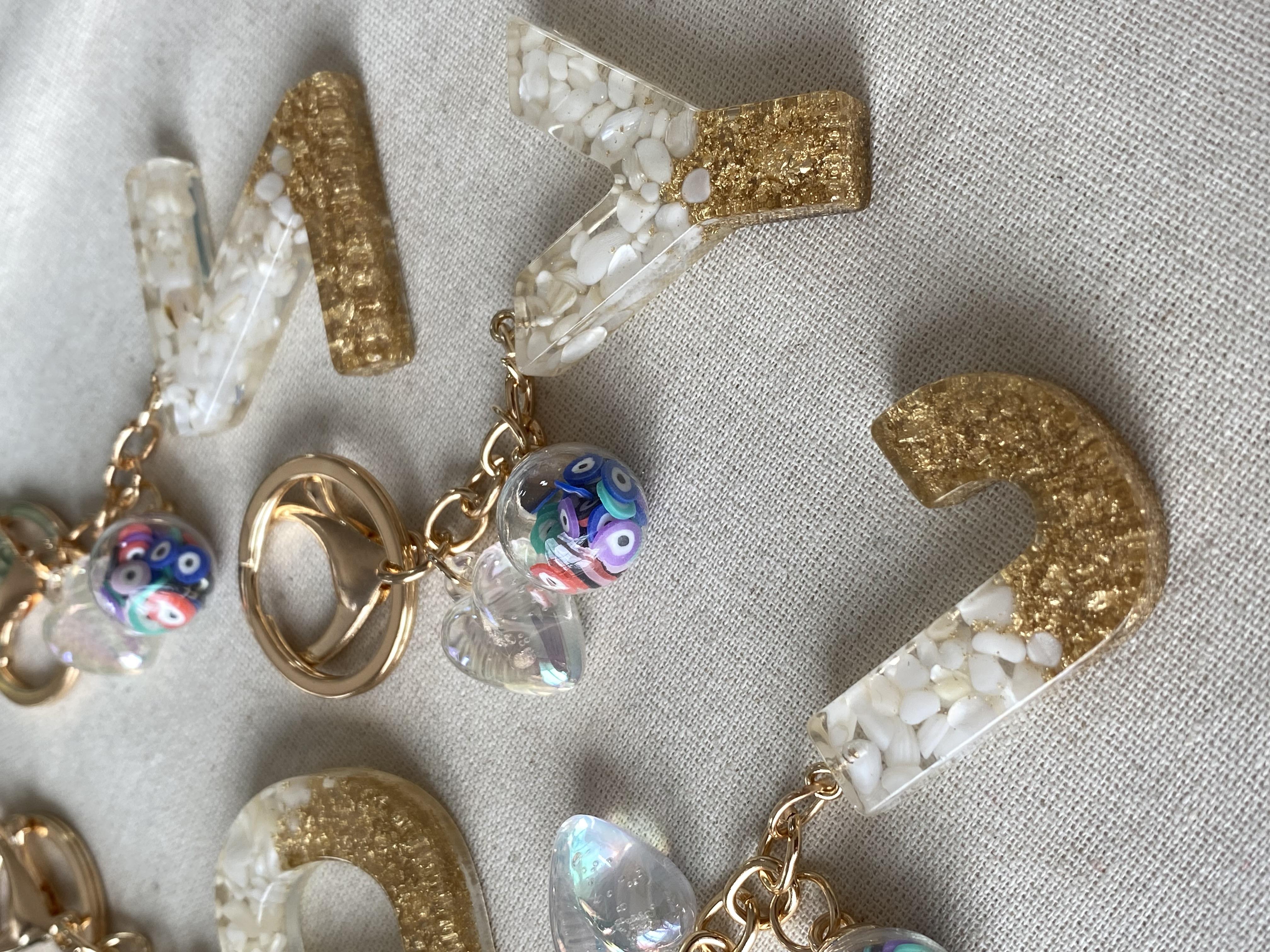 Krem Çakıl Taşı Simli Anahtarlık