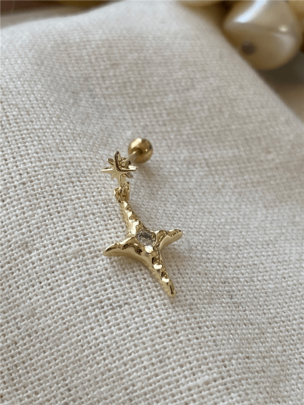 Sallantılı Kutup Yıldızı Piercing