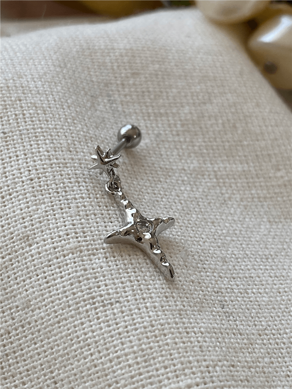 Sallantılı Kutup Yıldızı Piercing