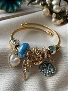 Çelik Gold Kordonlu Mavi Taşlı Peri Charmlı Bileklik