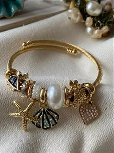 Çelik Gold Kordonlu Siyah Kabuklu Denizyıldızı Charmlı Bileklik