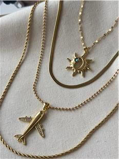 Çelik Güneş ve Uçak Charmlı Çoklu Kolye