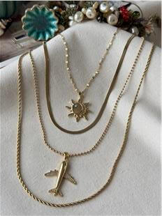 Çelik Güneş ve Uçak Charmlı Çoklu Kolye