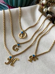 Çelik Nazarlı Burgu Harf Kolye