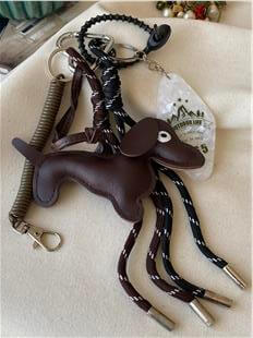 Kordon Detaylı Koyu Kahverengi Köpek Çanta Charmı