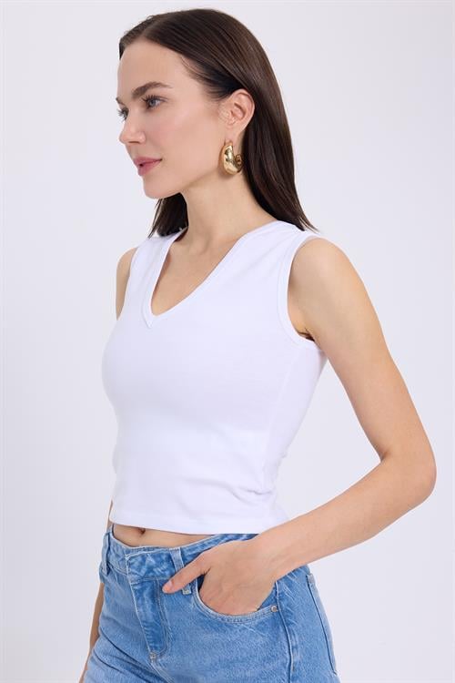 Kadın Slim Fit Dar Kesim V Yaka Sıfır Kol Pamuklu Ribanalı Beyaz Bluz