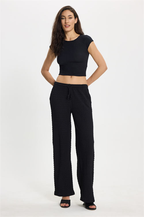 Kadın Slim Fit Dar Kesim Bisiklet Yaka Kolsuz Dokulu Siyah Bürümcük Bluz