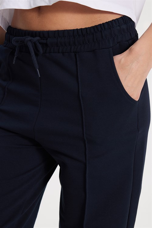 Kadın Relax Fit Rahat Kesim Pamuklu Lastikli Geniş Paça Likralı Lacivert Eşofman Altı