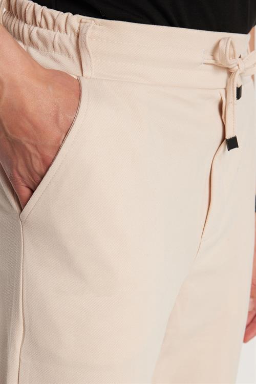 Erkek Slim Fit Pamuklu Beli Bağlamalı Yan Cepli Katlamalı Paça Jogger Bej Pantolon