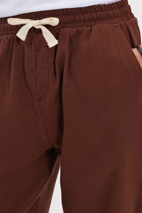 Erkek Baggy Fit Geniş Kesim %100 Pamuk Beli Lastikli Yandan Cepli Müslin Kahverengi Düz Pantolon