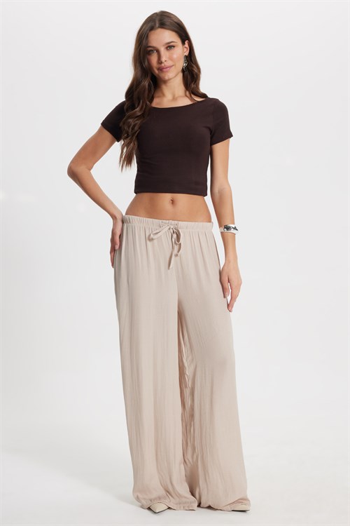 Kadın Relax Fit Rahat Kesim Beli Bağcıklı Lastikli Bol Paça Bej Pantolon