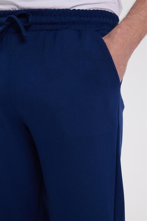 Erkek Slim Fit Dar Kesim Beli Bağcıklı 3 Cepli Geniş Paça Lacivert Eşofman Altı