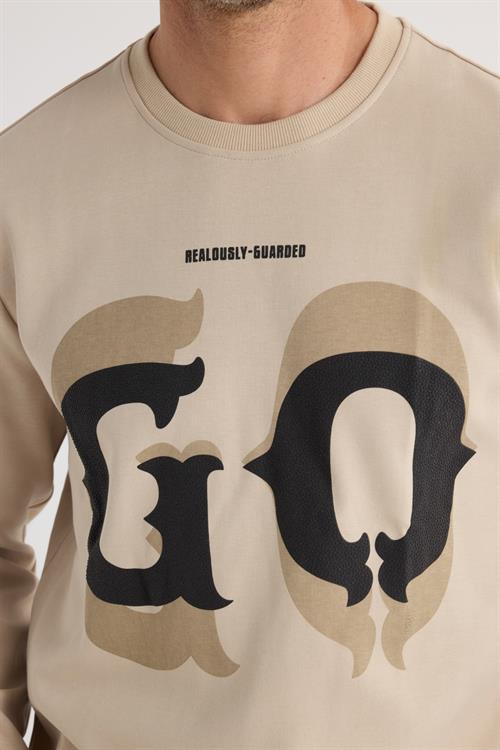 Erkek Relax Fit Rahat Kesim Pamuklu Lastikli Kol Bisiklet Yaka Baskılı Bej Sweatshirt