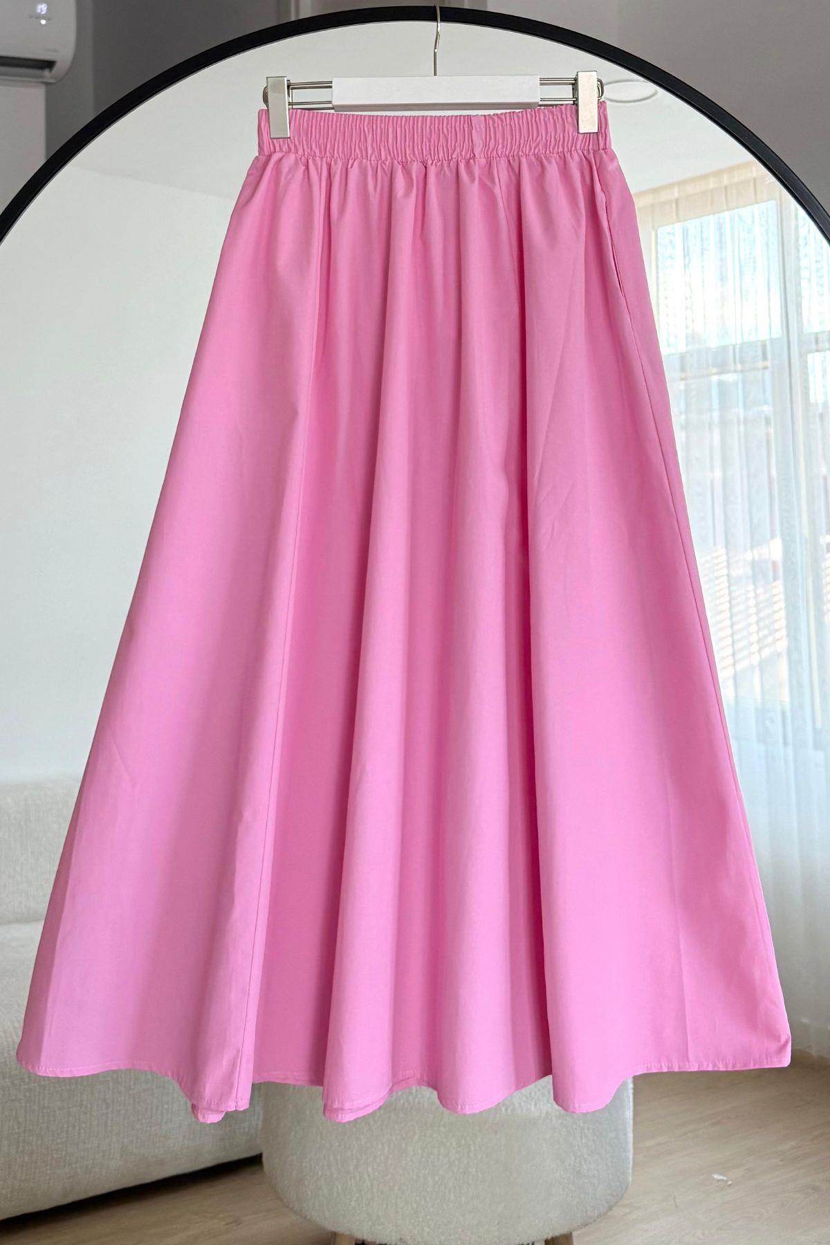 PEMBE BELİ LASTİKLİ CEPLİ KLOŞ ETEK