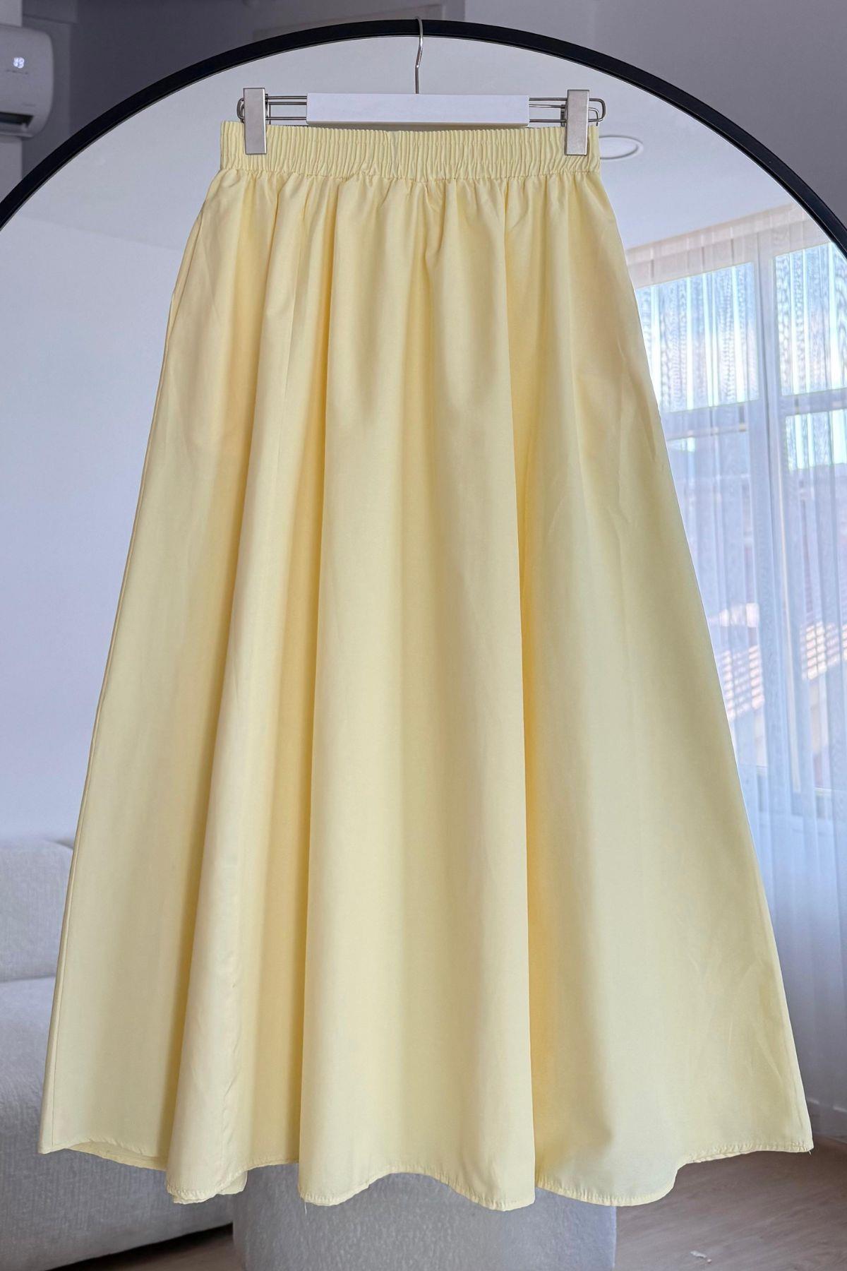 SARI BELİ LASTİKLİ CEPLİ KLOŞ ETEK