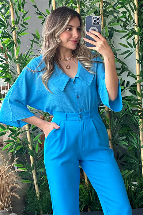 Mavi bebe yaka kolları volanlı gömlek