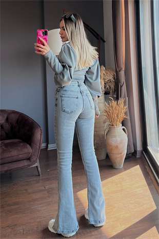 Paçası yırtmaç detaylı füme jean