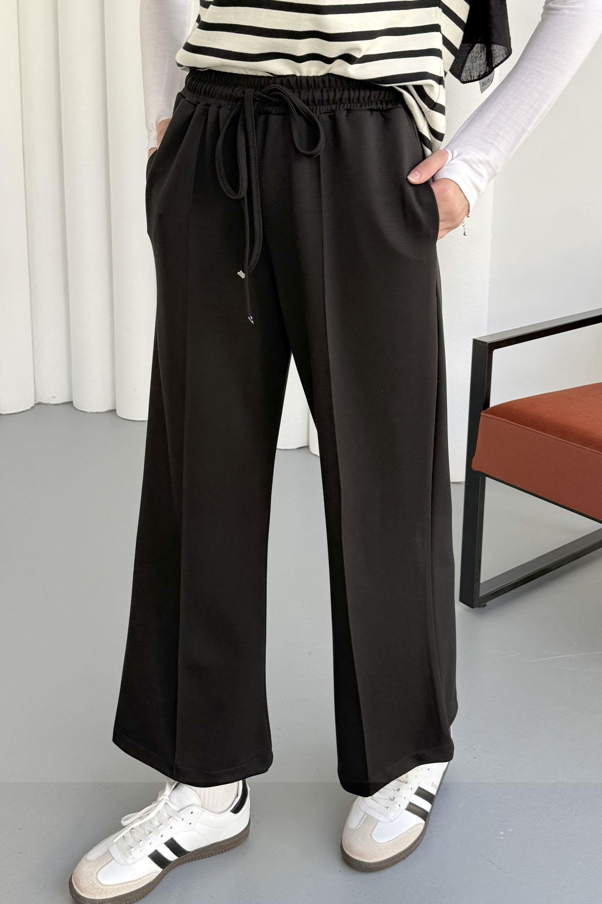 Biyeli Bol Paça Oysho Kumaş Pantolon-SİYAH