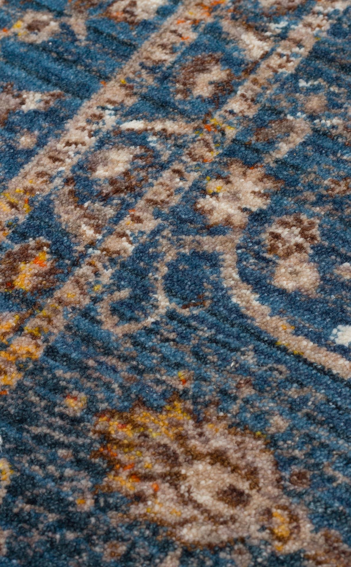 PIETRA PTA 18 NAVY  Sıcak Renk Tonlarını Etnik Desenler ile Buluşturan Yumuşak Tuşeli Makine Halısı