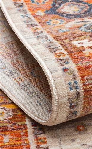 PIETRA PTA 01 CREAM TERRA  Sıcak Renk Tonlarını Etnik Desenler ile Buluşturan Yumuşak Tuşeli Makine Halısı