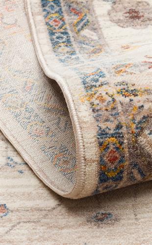 PIETRA PTA 16 CREAM MULTY  Sıcak Renk Tonlarını Etnik Desenler ile Buluşturan Yumuşak Tuşeli Makine Halısı