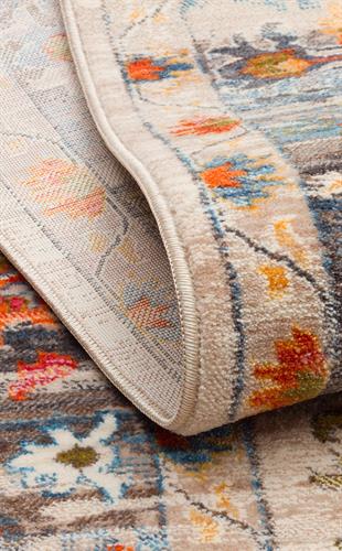 PIETRA PTA 19 BEIGE MULTY  Sıcak Renk Tonlarını Etnik Desenler ile Buluşturan Yumuşak Tuşeli Makine Halısı