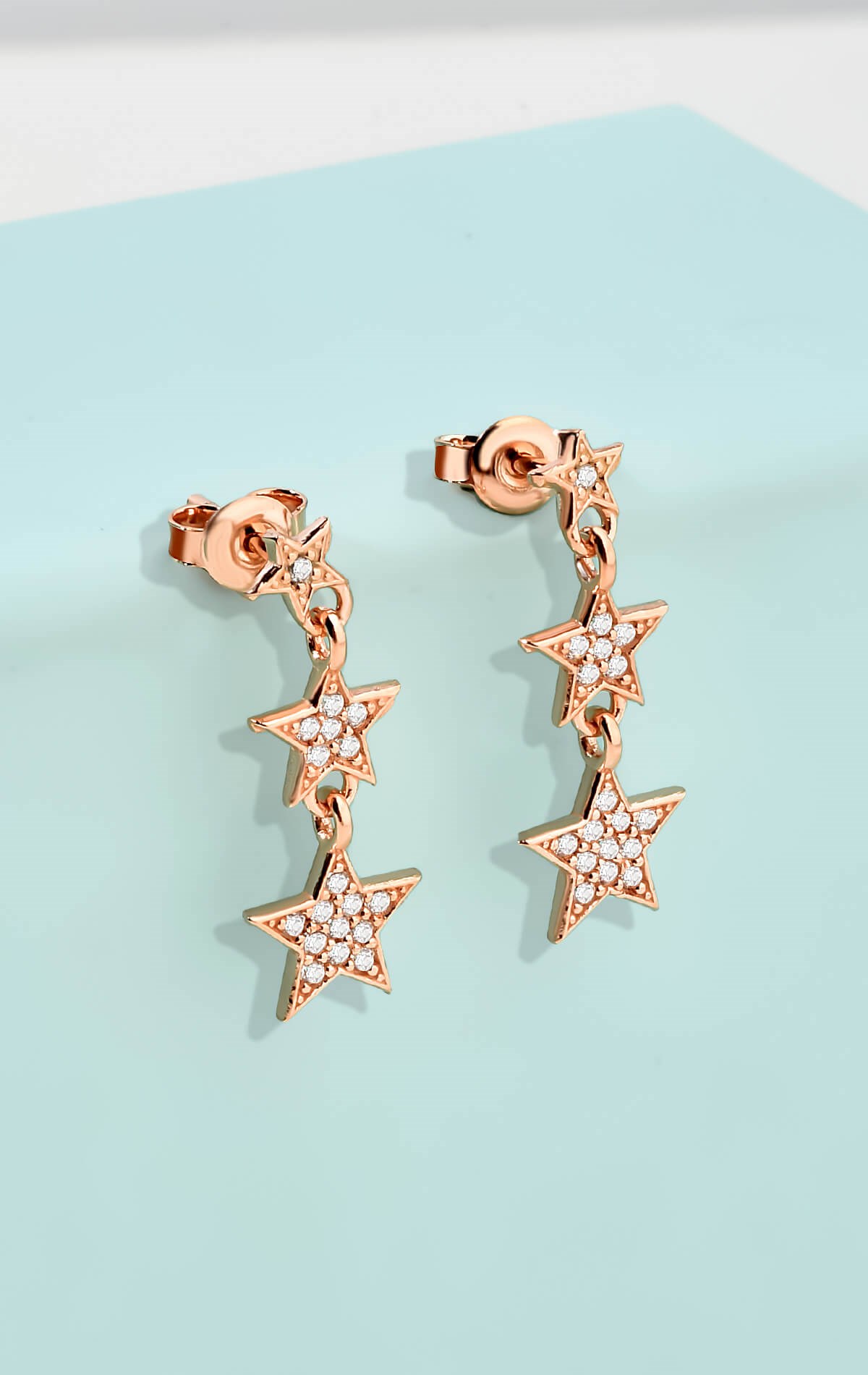 Gümüş Rose Renkli Zirkon Taşlı Sıralı Yıldızlar Model Küpe