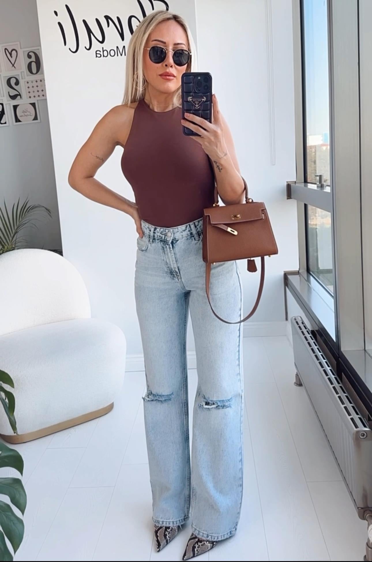 AÇIK RENK YIRTIKLI FLARE JEAN