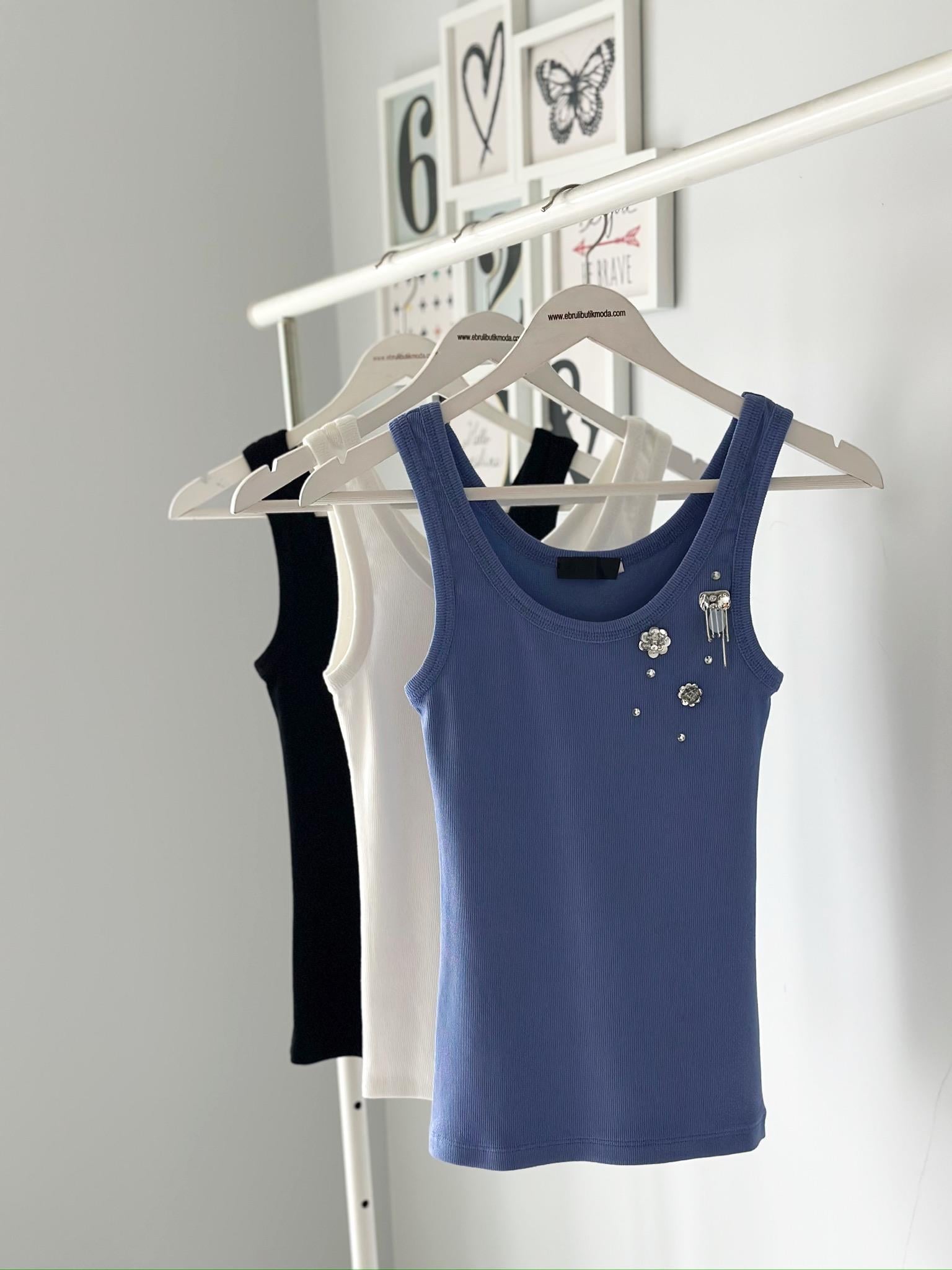 ÇİÇEK TAŞLI ATLET