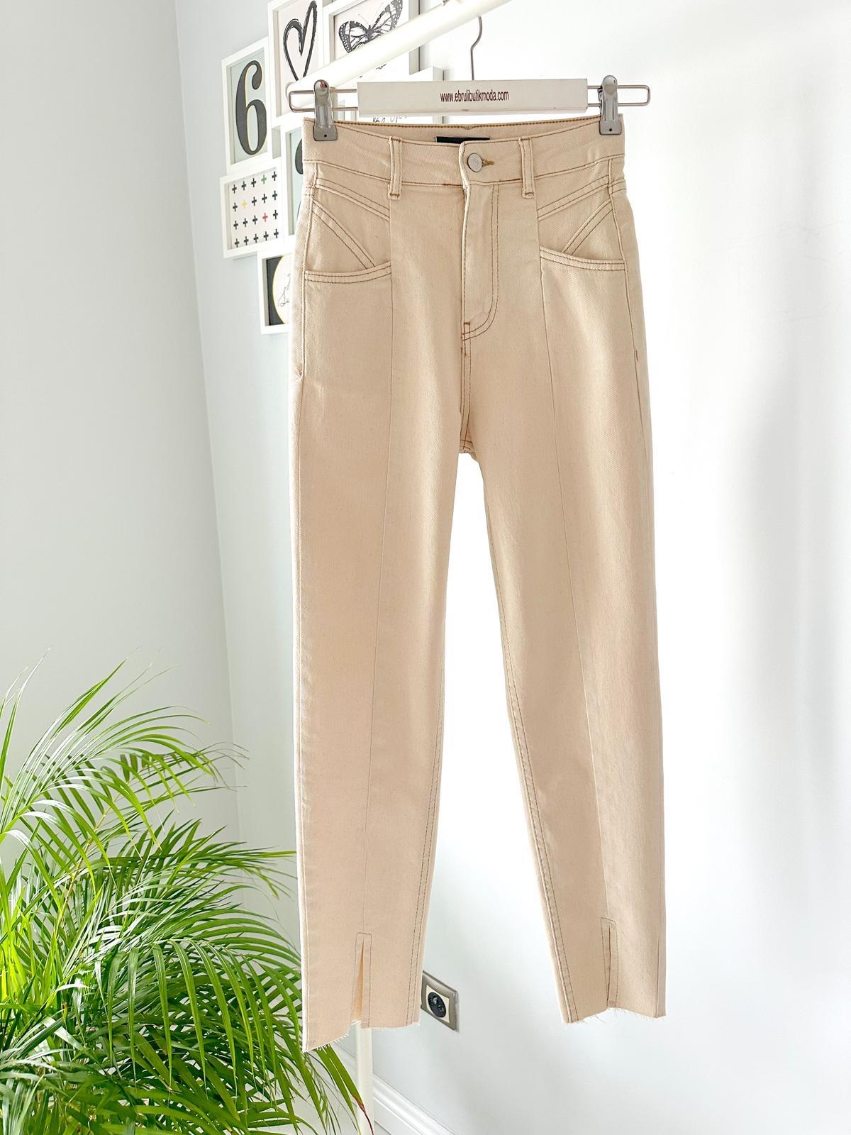 ÖNDEN YIRTMAÇLI PANTOLON