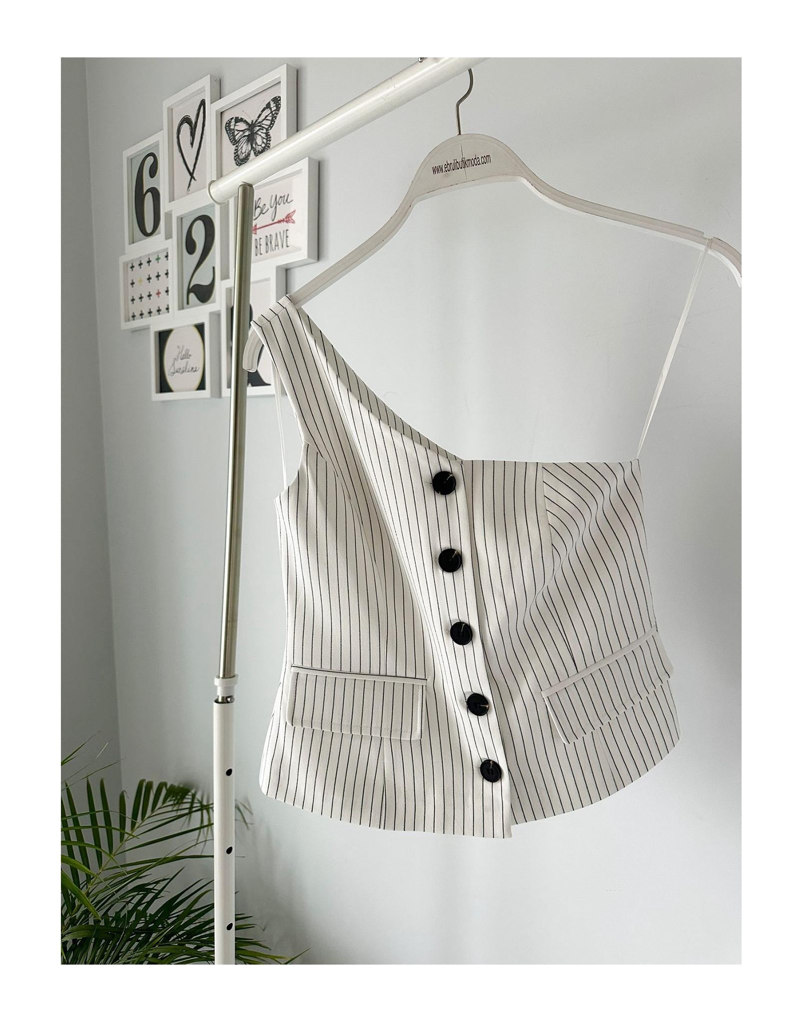 TEK OMUZ ÇZGİLİ YELEK