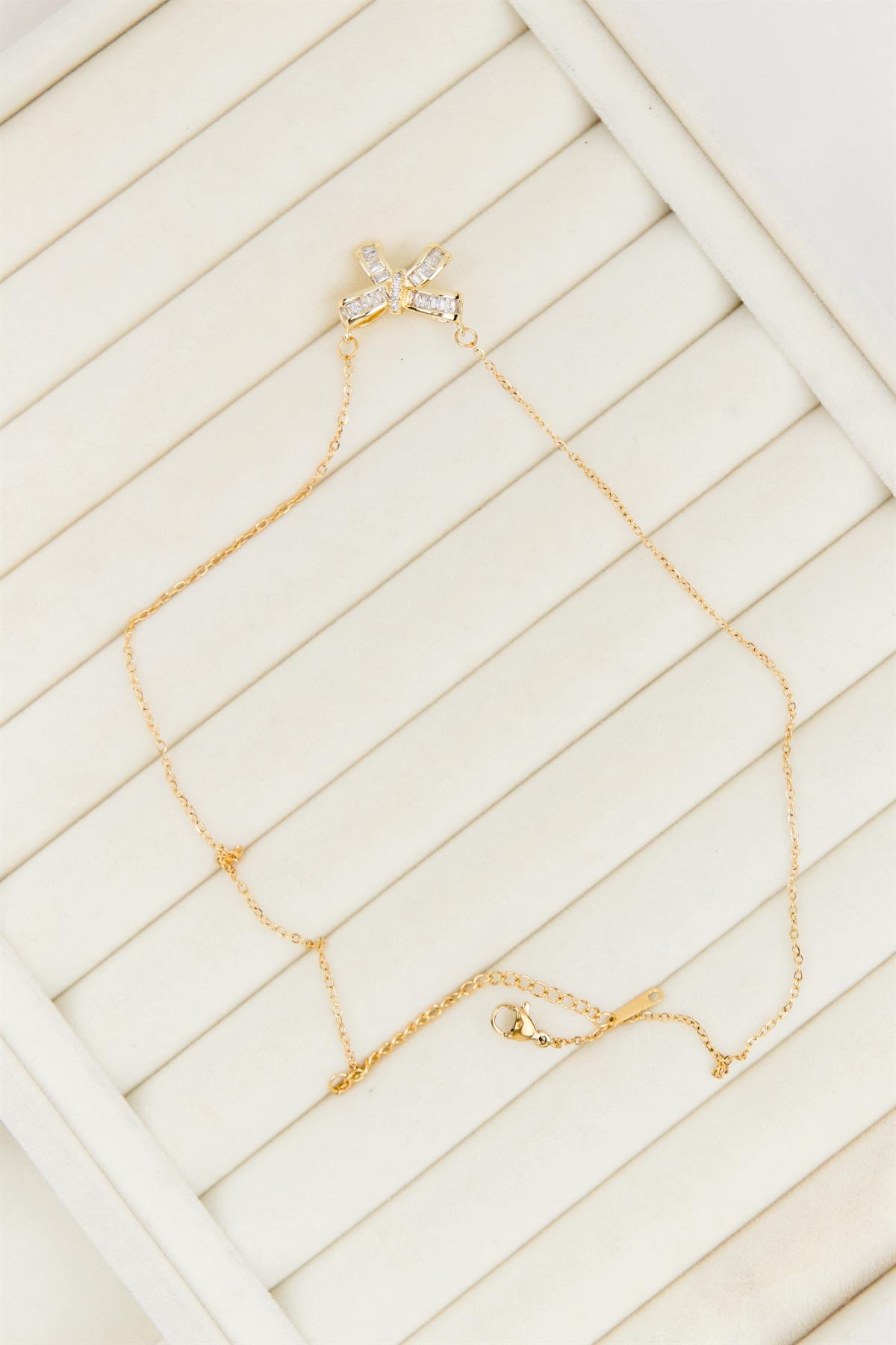 Fiyonk Figürlü Baget Taşlı Gold Çelik Kolye