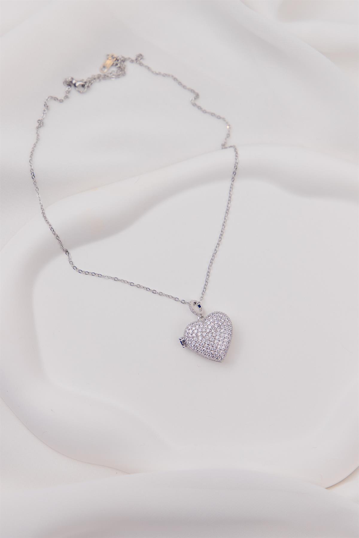 Kalp Figürlü Zirkon Taşlı Gümüş Kapaklı Çelik Kolye