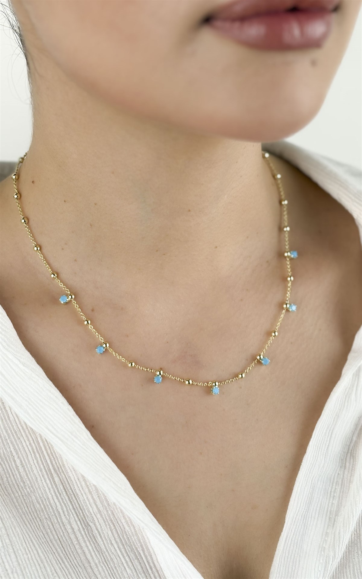 Topçuk ve Mavi Taş Sıralı Kolye