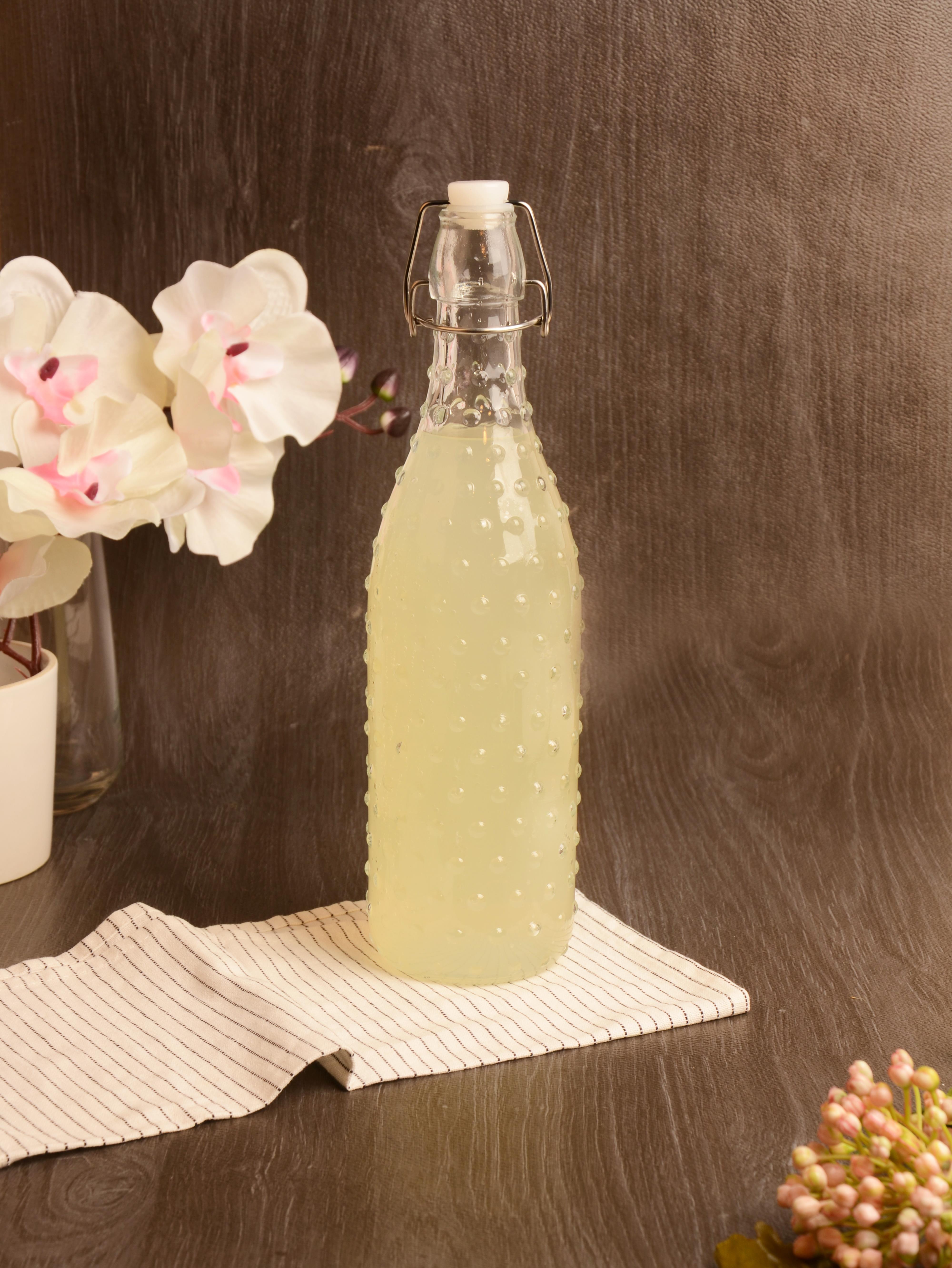 PAÇİ-KELEPÇELİ CAM ŞİŞE