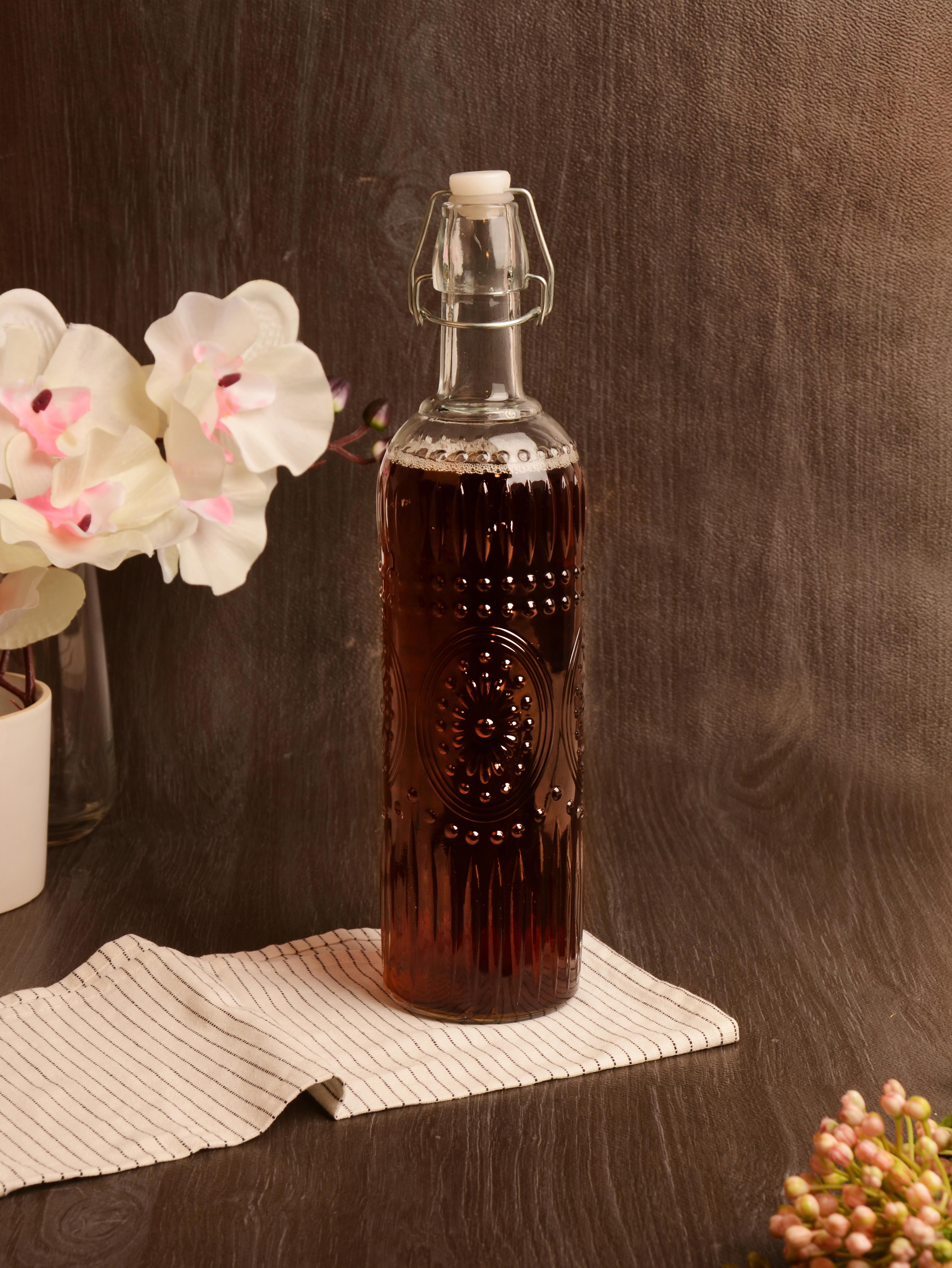 PAÇİ-KELEPÇELİ CAM ŞİŞE