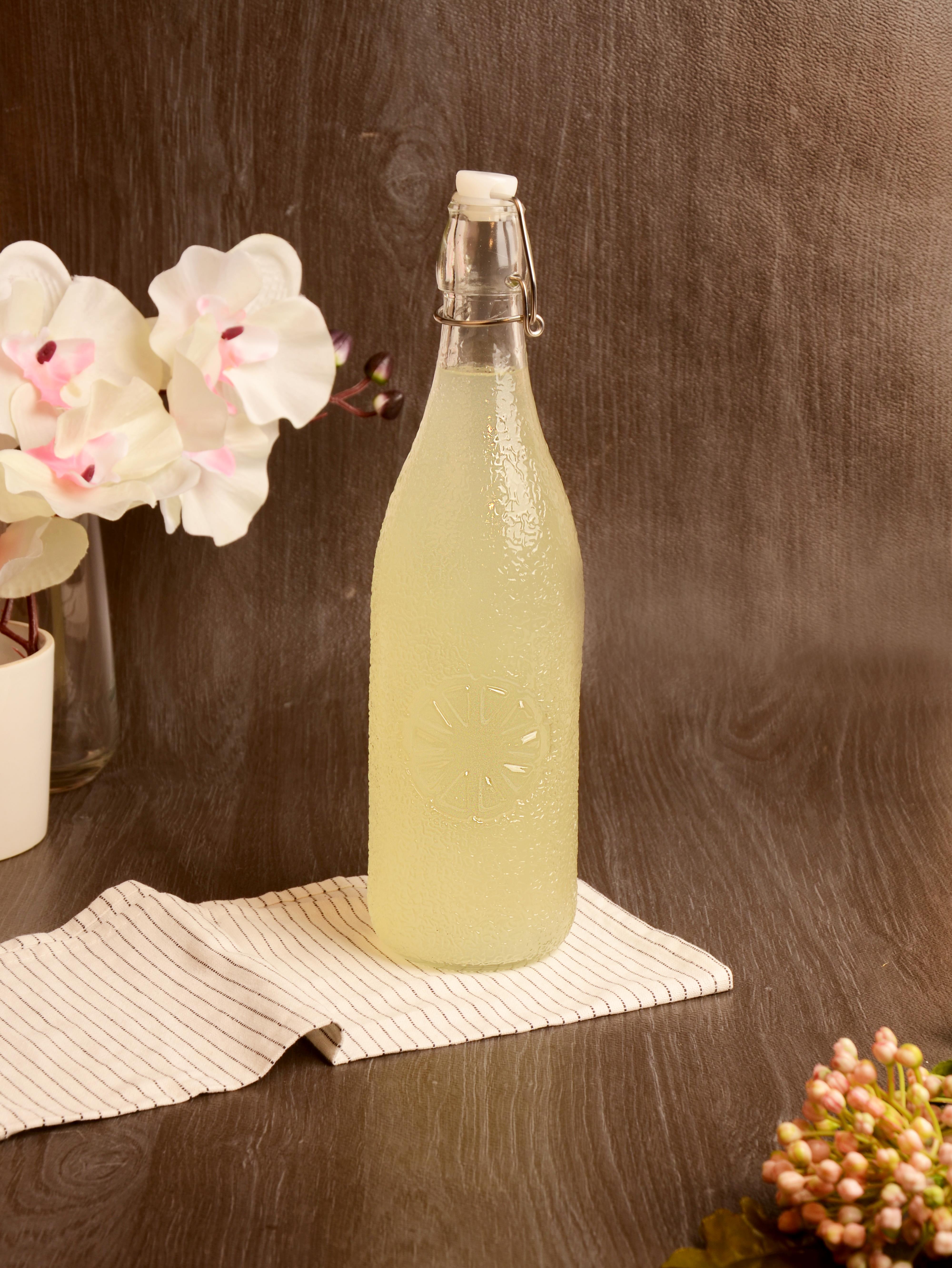 PAÇİ-KELEPÇELİ CAM ŞİŞE