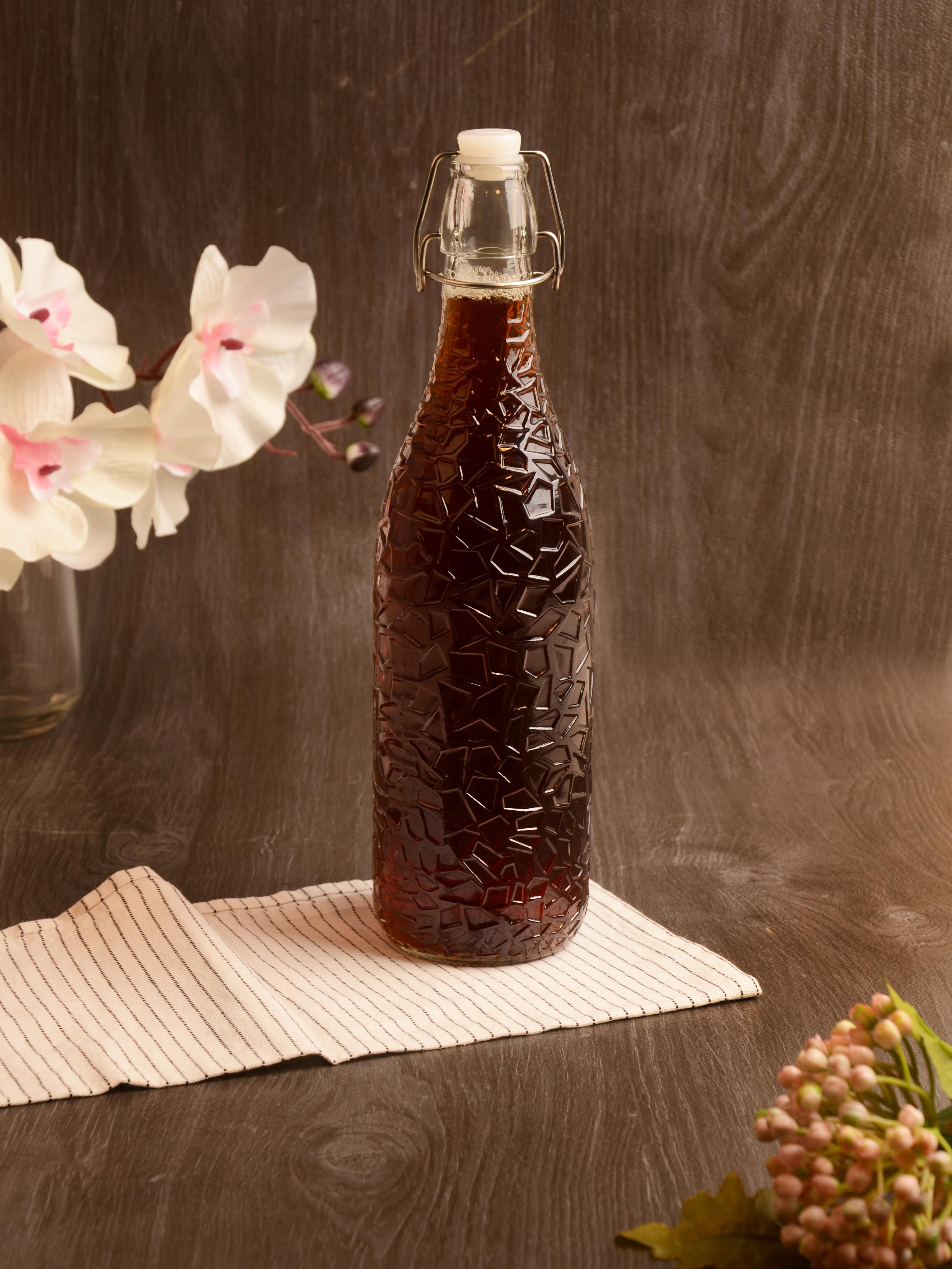 PAÇİ-KELEPÇELİ CAM ŞİŞE