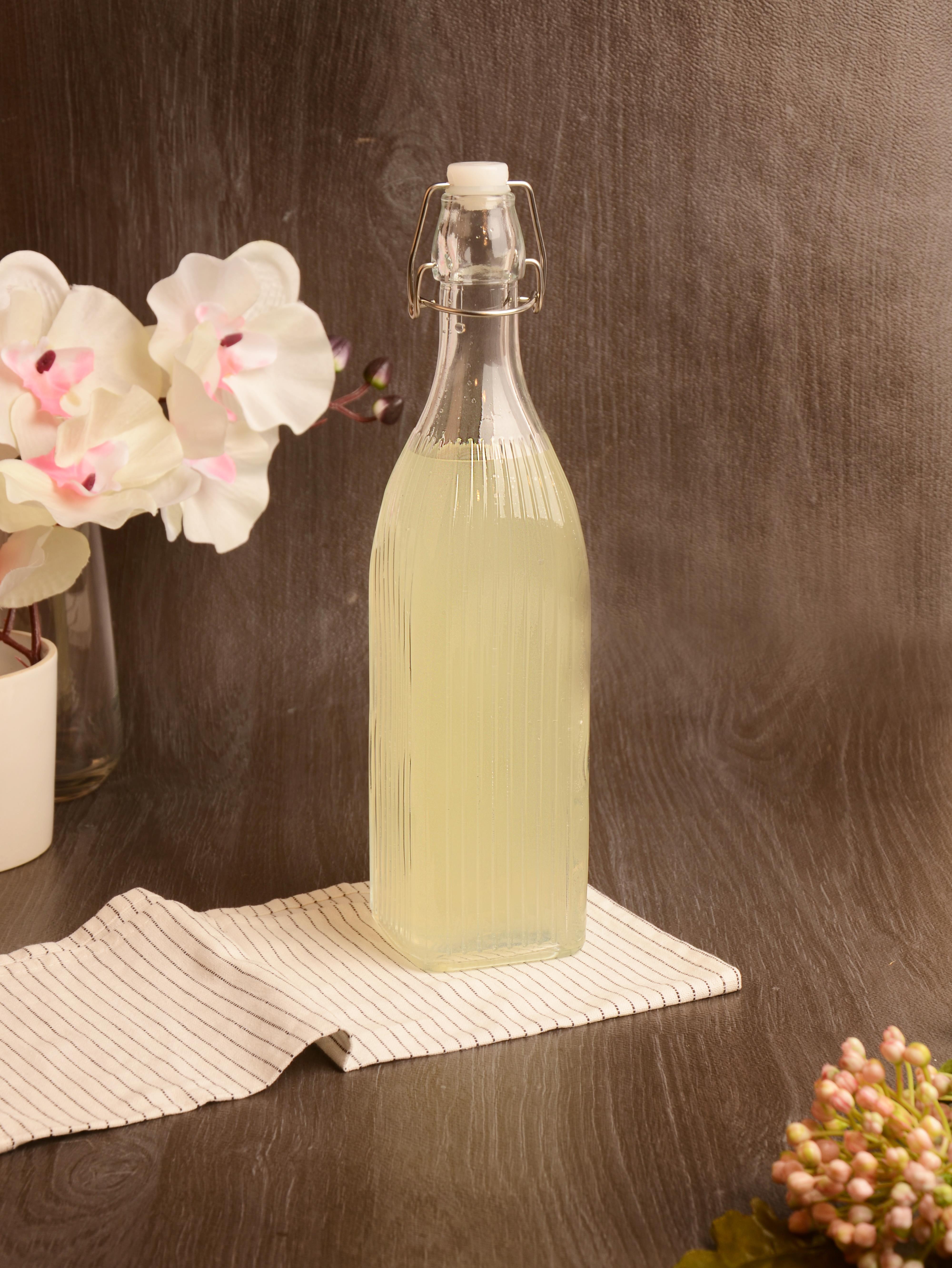 PAÇİ-KELEPÇELİ CAM ŞİŞE