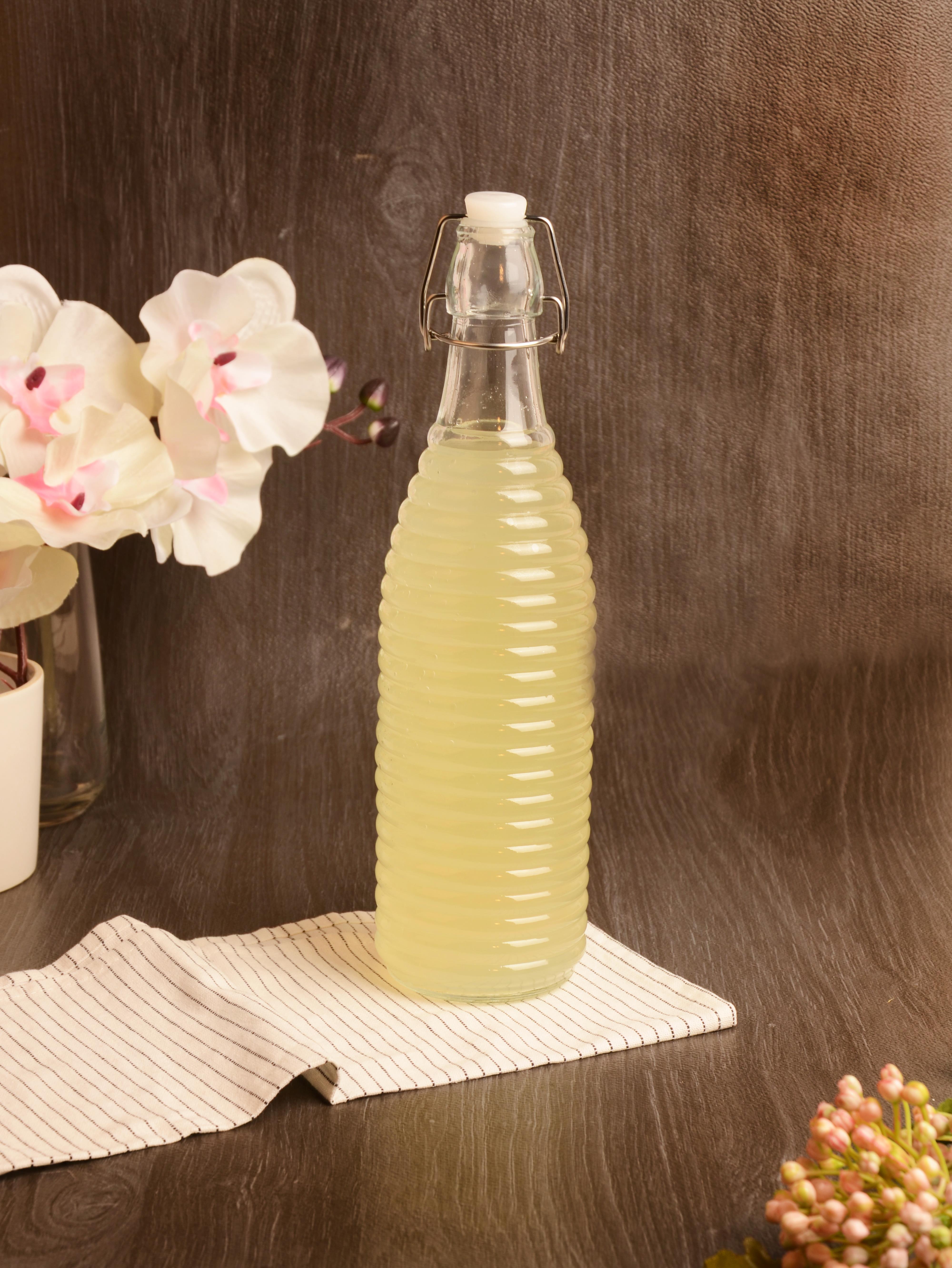 PAÇİ-KELEPÇELİ CAM ŞİŞE